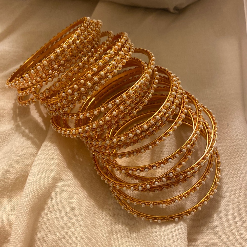 Set of 24 Indian gold bangles